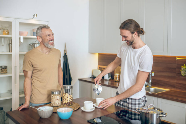 Lgbt couple having breakfast together at home - Photo, image