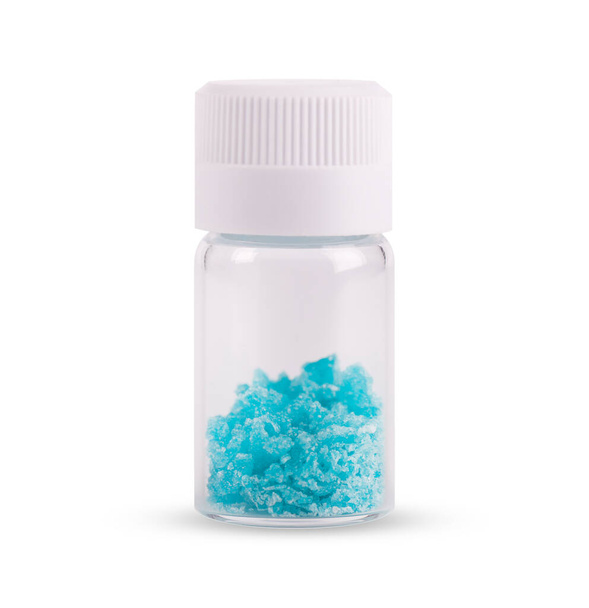 Blue crystal of methamphetamine isolated on white background. Blue ice, bath salt, drug. Blue meth. - Photo, Image