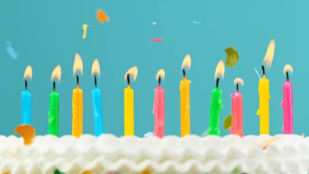 Birthday cake with candles on color background - Zdjęcie, obraz