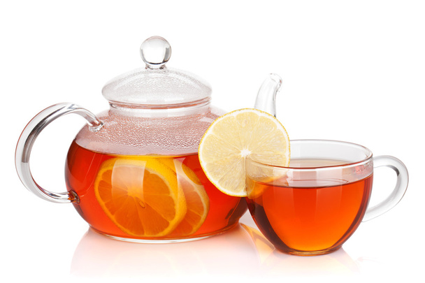 γυαλί Κύπελλο και teapot μαύρο τσάι με λεμόνι - Φωτογραφία, εικόνα