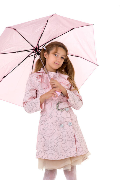 Beautiful teenage girl under pink umbrella - Foto, immagini