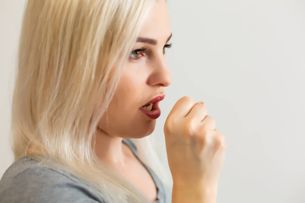 Pretty blond girl coughing, ill - Foto, Imagen