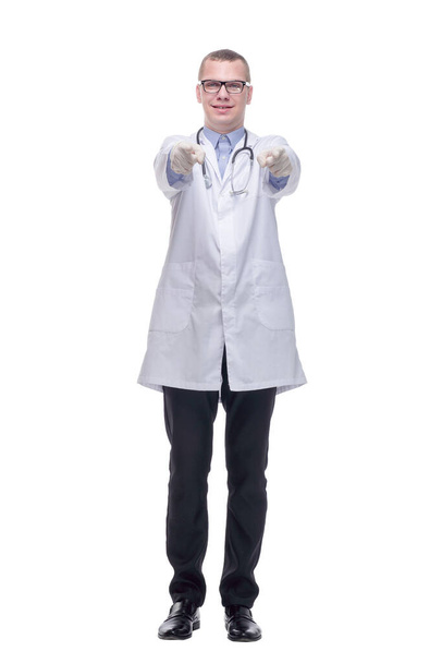 Portrait of attractive handsome doctor wearing glasses and gloves with thumb up - Foto, Imagen