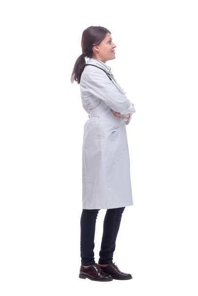 Female doctor full body side view on white background - Photo, Image