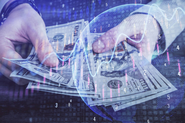 Multi exposure of financial graph drawing hologram and USA dollars bills and man hands. Analysis concept. - Fotoğraf, Görsel