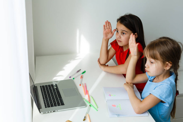Learning from home, Home school kid concept. Little children study online learning from home with laptop. Quarantine and Social distancing concept. - Foto, Imagen