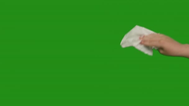 Main féminine avec une serviette blanche, lingettes, gros plan, chromatique - Séquence, vidéo