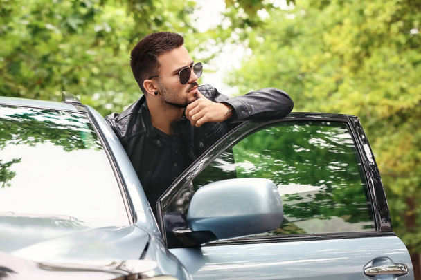 Handsome man near modern car - Zdjęcie, obraz