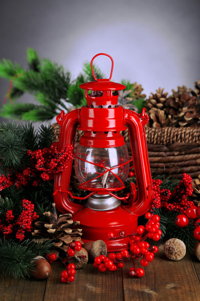 Red kerosene lamp on dark background - Foto, imagen