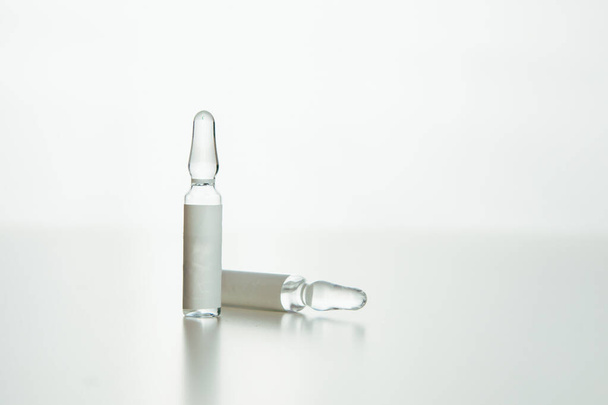 view of medical ampoules with copy space white background - Φωτογραφία, εικόνα