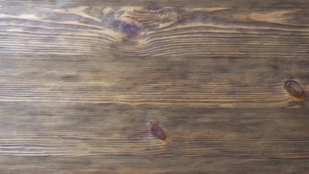 Madeira placa de textura de fundo de madeira. Pan sobre textura de madeira - Filmagem, Vídeo