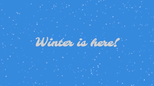 Der Winter ist da! Textinschrift auf schneebedecktem Hintergrund. Schnee fällt auf blauem Hintergrund. - Filmmaterial, Video