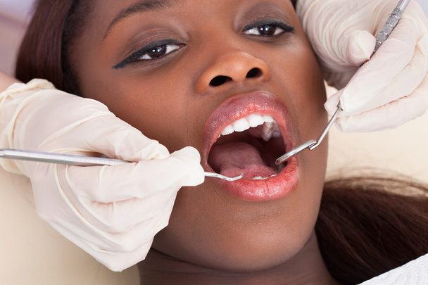 Female Patient Being Checked By Dentist - Φωτογραφία, εικόνα
