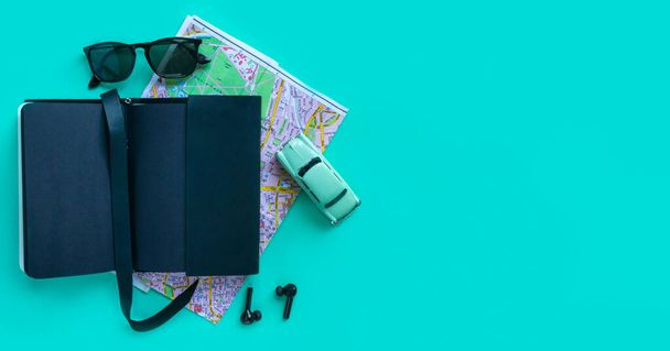 Fashion men accessories and devices on turquoise background. View from top, Flat lay and copy space - Fotoğraf, Görsel