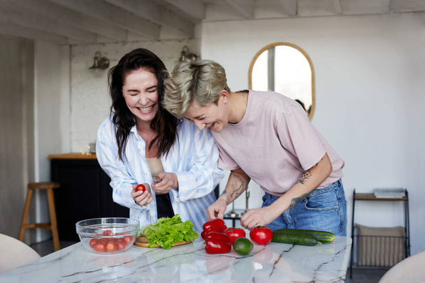Happy girlfriends preparing healthy lunch - Fotoğraf, Görsel