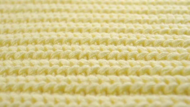 Macro pattern of woolen sweater close up. Yellow Parallel Knitted Rows - Filmati, video