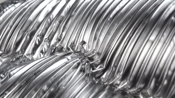 Tubo corrugado de aluminio arrugado, material triturado corrugado por ventilación. Macro. Dolly Shot - Imágenes, Vídeo
