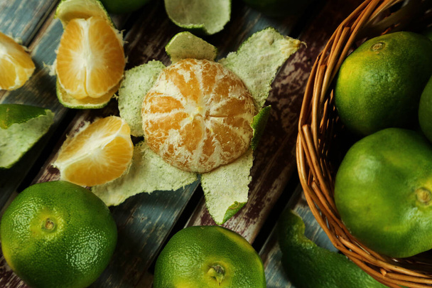 Green sweet tangerines growing with background - Zdjęcie, obraz