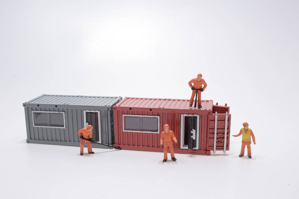  la mini figura con la escala contenedores de carga Casas - Foto, Imagen