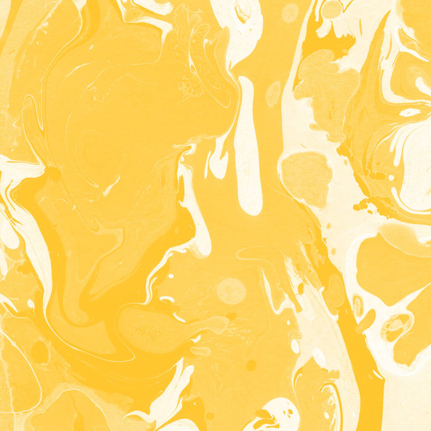 yellow marble background with paint splashes texture - 写真・画像