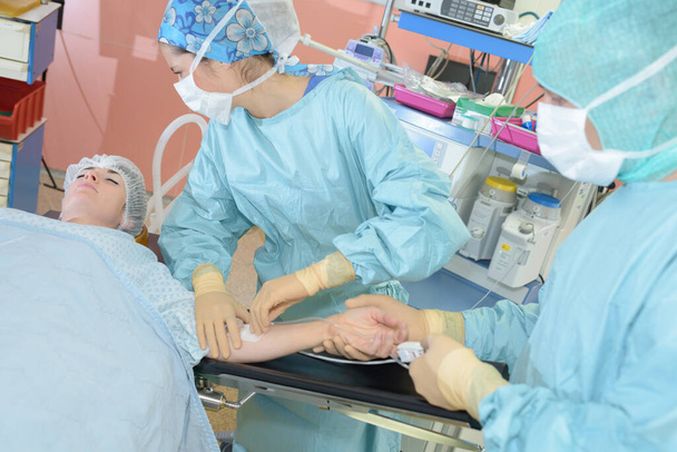 medical team performing operation - Photo, image
