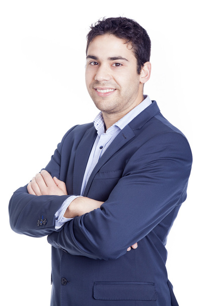 Confident business man smiling on grey background - Foto, Imagen