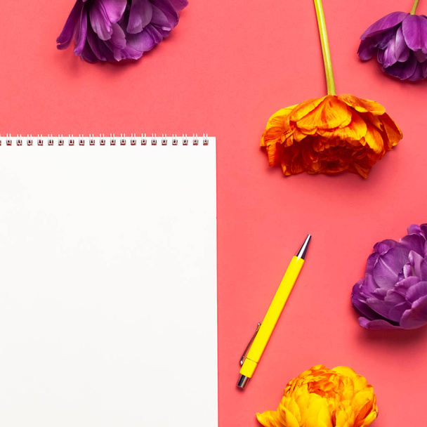 Flat lay Spring flowers. Yellow lilac peony tulips white blank album notebook writing pen on pink background. Lovely greeting card for March 8, Mothers day, holiday, birthday wedding or happy event. - Foto, Imagen