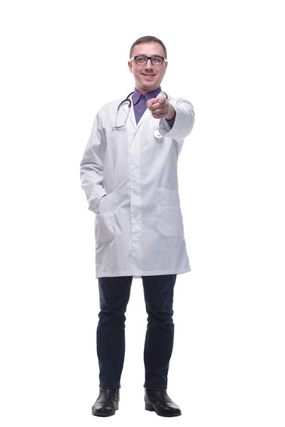 Confident smiling doctor with lab coat pointing an looking at camera - Фото, зображення