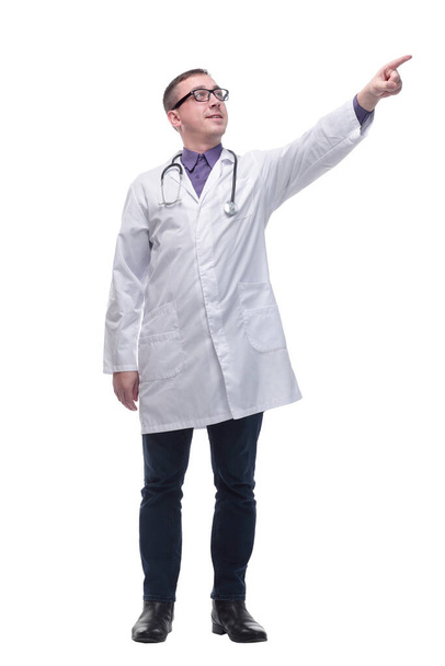 Young doctor man wearing white coat and stethoscope with smile on face - Фото, зображення
