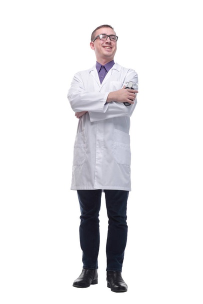 Front view portrait of confident male doctor standing with arms crossed - Foto, imagen