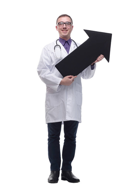 Front view of doctor holding a black arrow pointing right - Photo, image