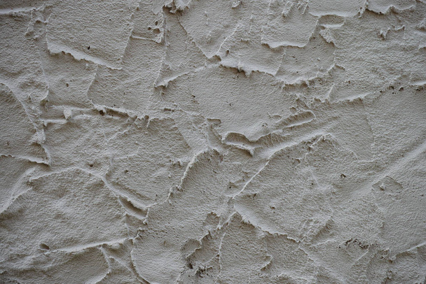 A closeup shot of an old cement wall - good for background - Fotó, kép