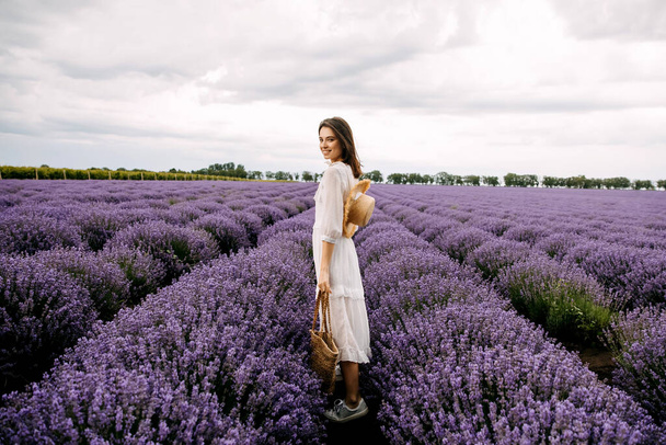 portrait of beautiful woman in lavender field - Фото, зображення