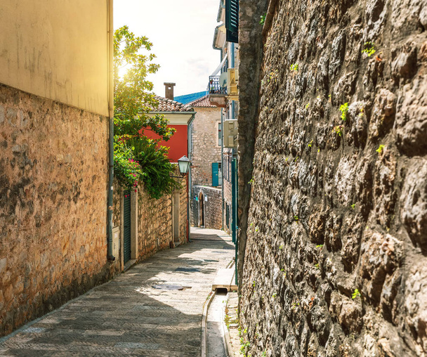 Traditional narrow street in Europe, Old Town of Herceg Novi, Montenegro - Foto, imagen