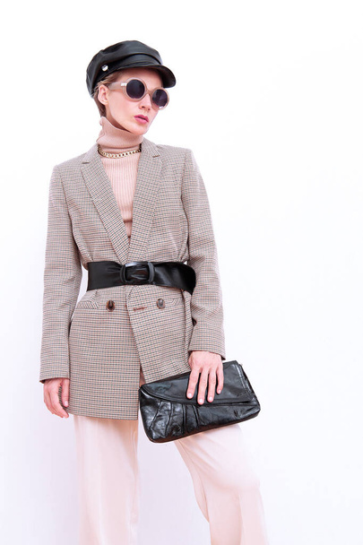 Paris Girl. Details of everyday look. Casual beige outfit and accessories. Trendy Minimalistic style. Total Beige retro aesthetics. Fashion fall winter spring look book. - 写真・画像