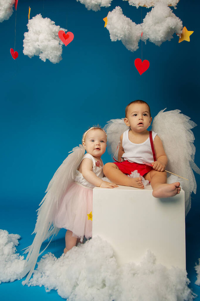 Two young angel children on Valentine's Day - Fotoğraf, Görsel