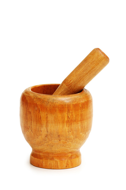 Old wooden mortar and pestle isolated on white - Photo, Image
