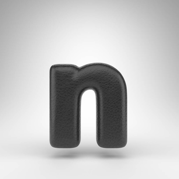 N betű kisbetűvel, fehér háttérrel. Fekete bőr 3D renderelt betűtípus bőr textúrával. - Fotó, kép