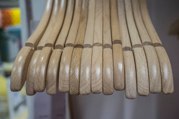 Empty wooden hangers. Selective focus - Photo, Image