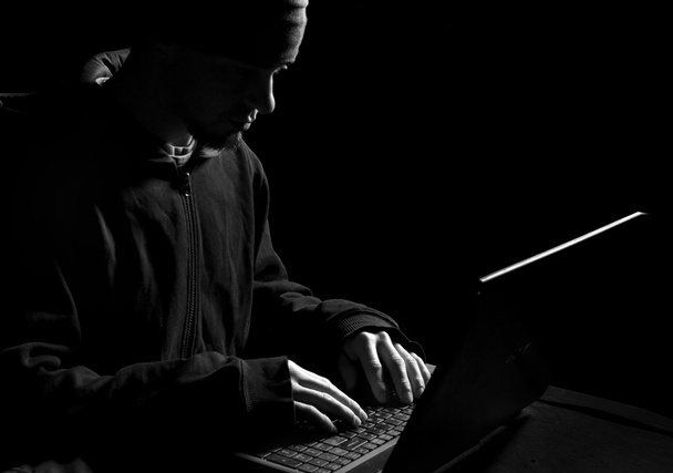 Silhouette of a hacker - Photo, Image
