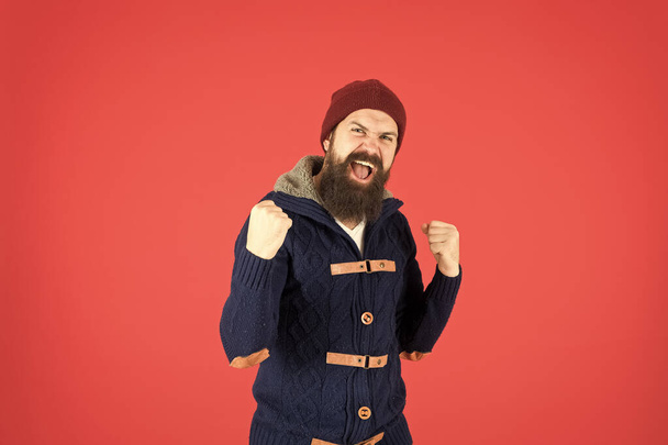 Real feelings. hipster mens jacket. happy man autumn style. beard care in winter. male fashion. brutal man knitted hat. knitted hat accessory. bearded man knitwear sweater. get warm and comfortable - Photo, Image