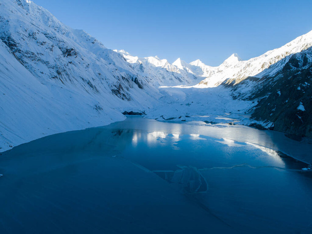 Aerial view of beautiful frozen glacier lagoon in Tibet,China - Fotó, kép