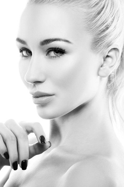 Close-up beauty face of fashion model woman, perfect skin, lips, makeup. Monochrome - Photo, Image