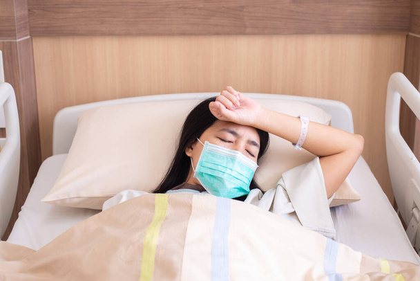 Patient asian women having a headache or migraine severe in hospital,Dengue fever - Fotó, kép