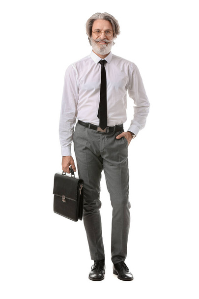 Portrait of senior businessman on white background - Foto, afbeelding