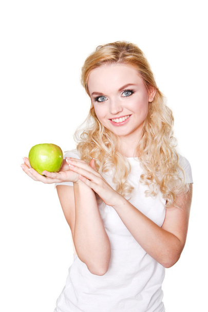 Portrait of young beautiful healthy blond girl with green apples - Fotó, kép