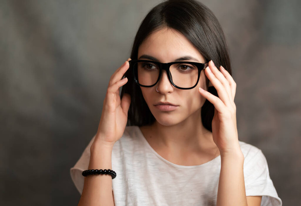 Portrait of woman wearing glasses. Selective focus. - Foto, Imagem