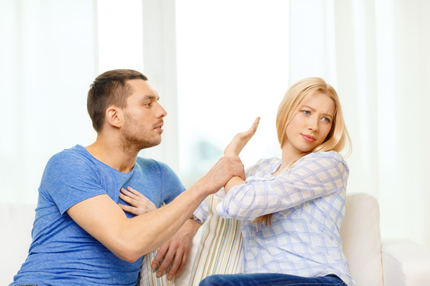 Unhappy couple having argument at home - Photo, Image