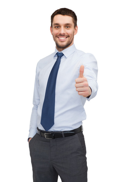 Handsome buisnessman showing thumbs up - Foto, immagini