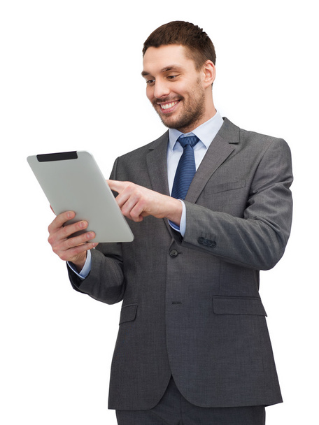 Smiling buisnessman with tablet pc computer - Foto, imagen